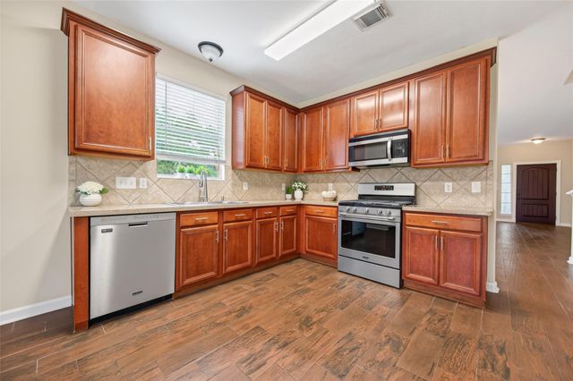 10427 Lyndon Meadows Drive, Houston, TX 77095