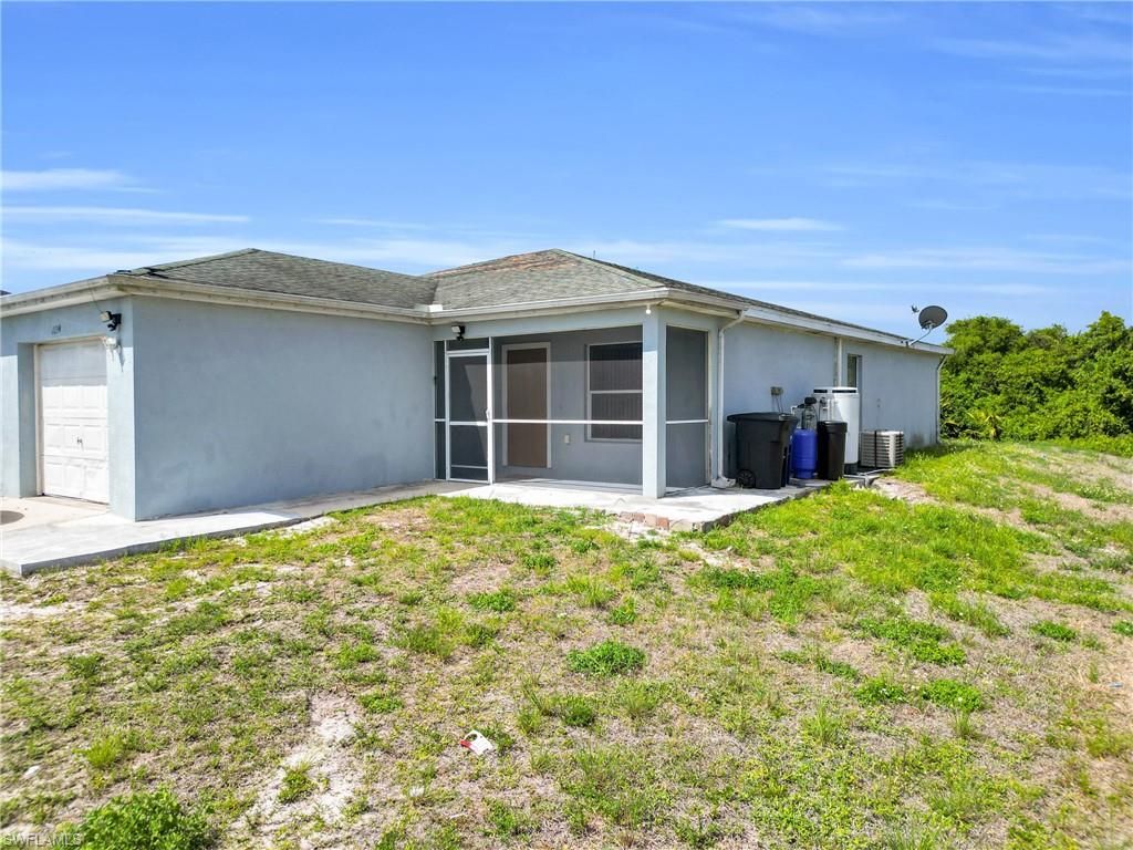 1132/1134 Ichabod AVE, LEHIGH ACRES, FL 33973 — exterior