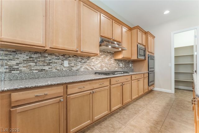 9729 Rock Partridge Court, Las Vegas, NV 89149