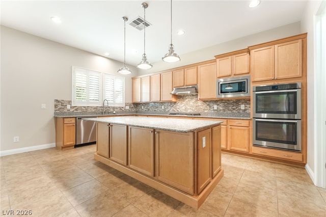9729 Rock Partridge Court, Las Vegas, NV 89149