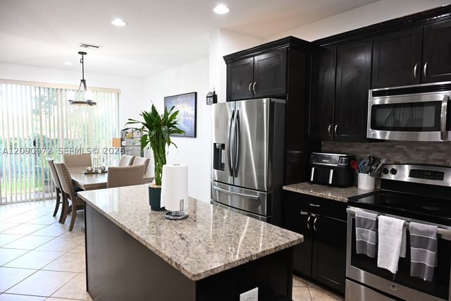 7722 SW 52nd Pl, Davie, FL 33328