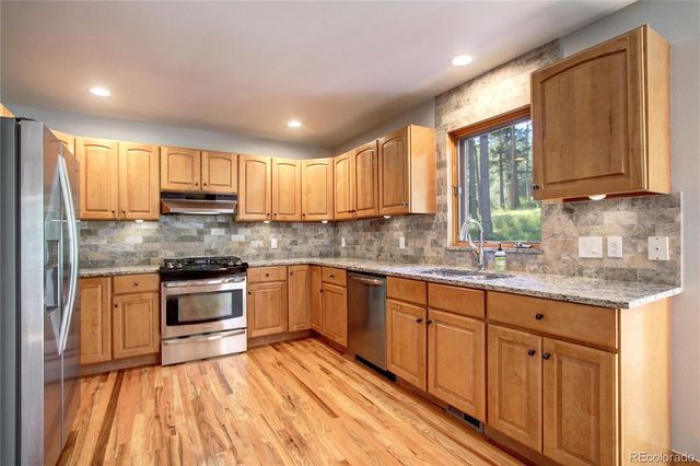 8095 S Wagon Wheel Road, Morrison, CO 80465