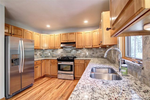 8095 S Wagon Wheel Road, Morrison, CO 80465