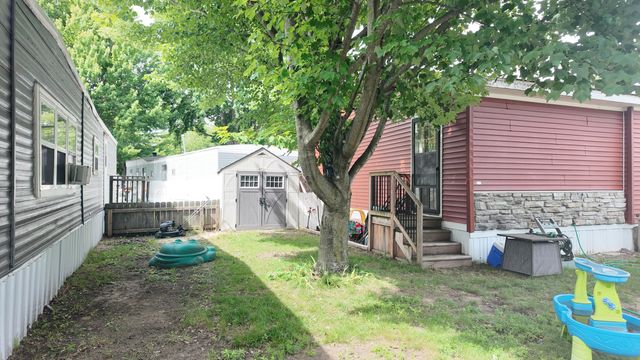 1281 E Pontaluna Road, Norton Shores City, MI 49456