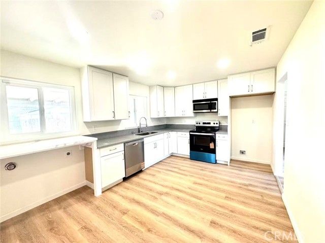 2002 N Woodridge, Hanford, CA 93230