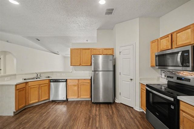 909 BRISTLE CONE COURT, Minneola, FL 34715