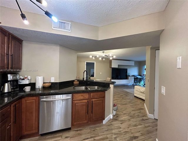 8977 Wiles Rd 208, Coral Springs, FL 33067