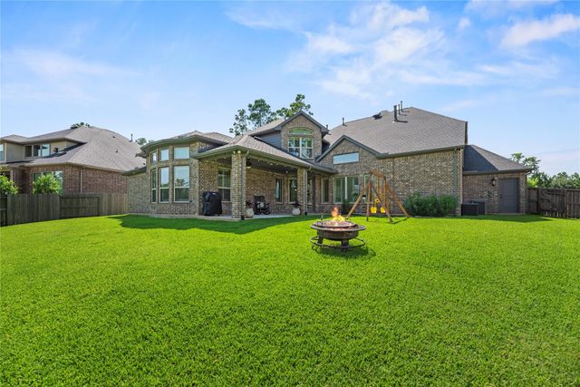 1002 Pleasant Pines Lane, Pinehurst, TX 77362
