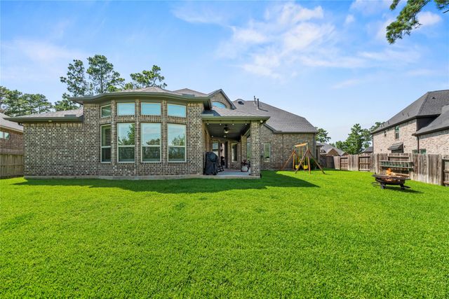 1002 Pleasant Pines Lane, Pinehurst, TX 77362