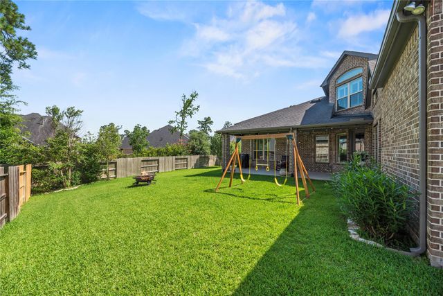 1002 Pleasant Pines Lane, Pinehurst, TX 77362