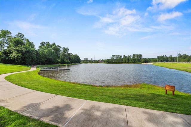 1002 Pleasant Pines Lane, Pinehurst, TX 77362