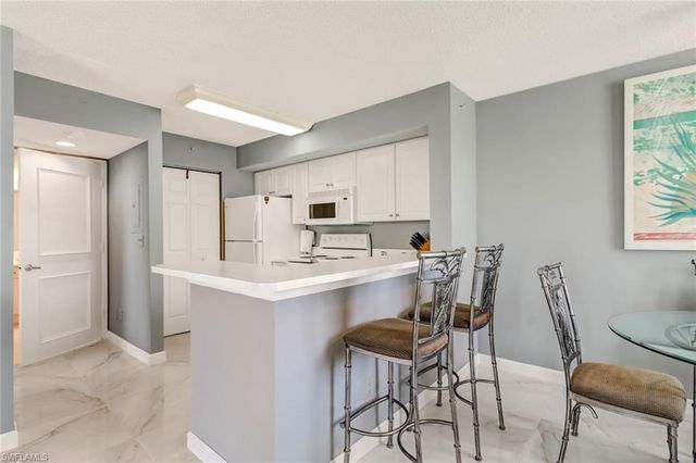 1265 Wildwood Lakes BLVD 102, Naples, FL 34104