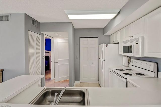 1265 Wildwood Lakes BLVD 102, Naples, FL 34104