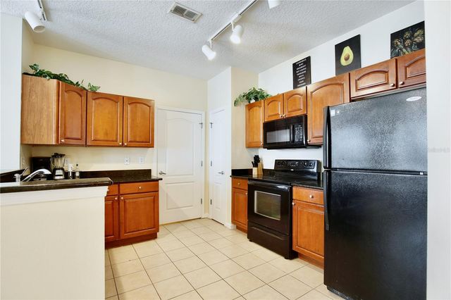 5255 CANE ISLAND LOOP 204, Kissimmee, FL 34746