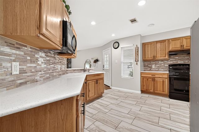 9909 Kingfisher Drive, Conroe, TX 77385