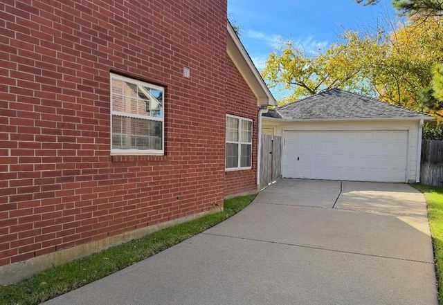 7911 Emerald Bluff Court, Houston, TX 77095