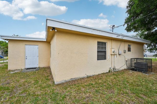 5618 Cinnamon Drive, West Palm Beach, FL 33415