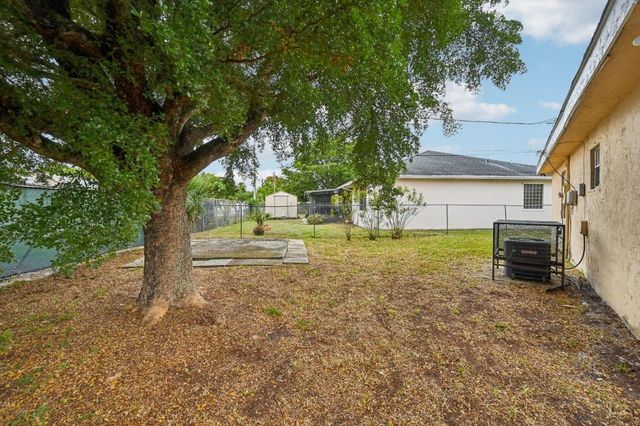 5618 Cinnamon Drive, West Palm Beach, FL 33415