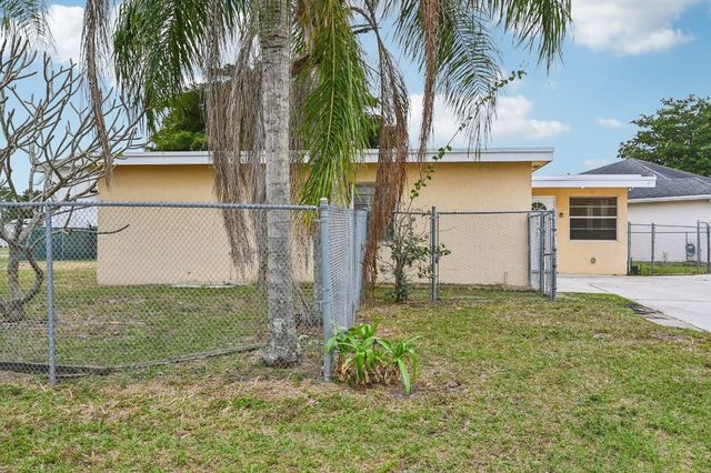 5618 Cinnamon Drive, West Palm Beach, FL 33415