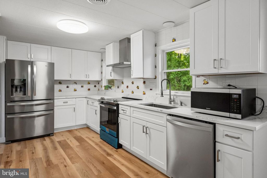 Image 6 of property listing at 12301 GALLAHAN RD, Clinton, MD 20735