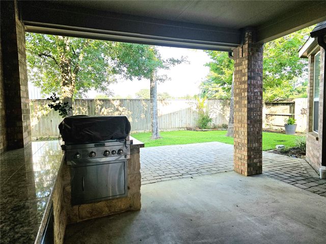22106 Flashing Ridge Drive, Spring, TX 77389