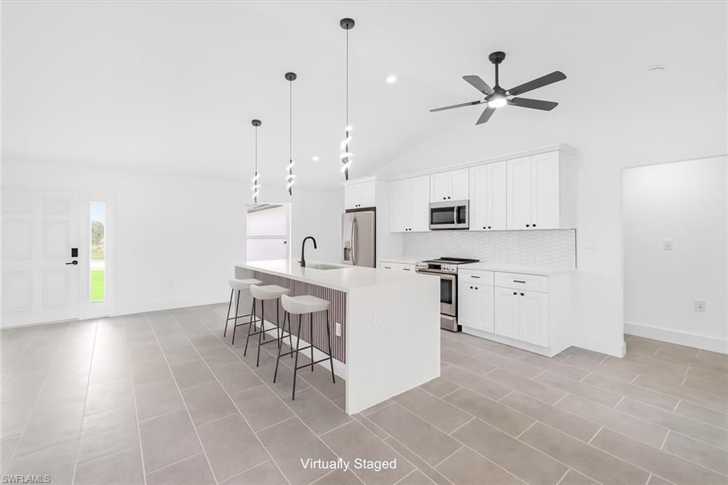 Image 6 of property listing at 55 Wilmington PKWY, Cape Coral, FL 33993