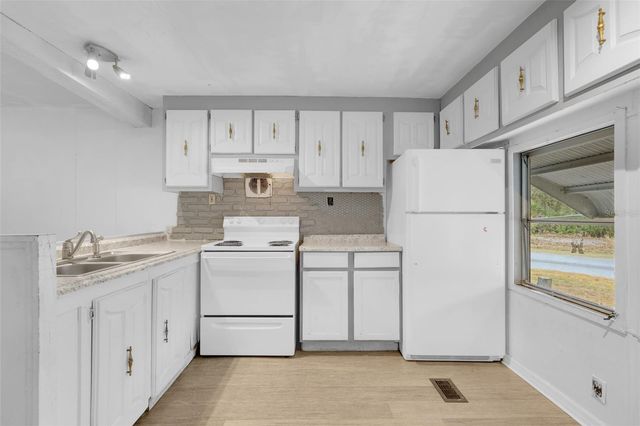 12623 MILWAUKEE AVENUE, Tavares, FL 32778