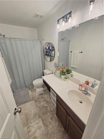 7369 Garett Park Drive, Whitsett, NC 27377