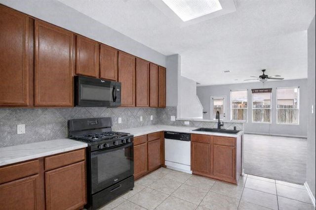 1726 Sun Point Court, Humble, TX 77396