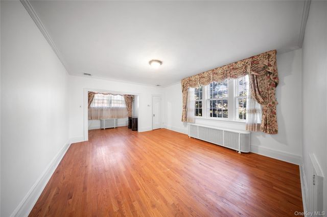 6954 Dartmouth Street, Forest Hills, NY 11375