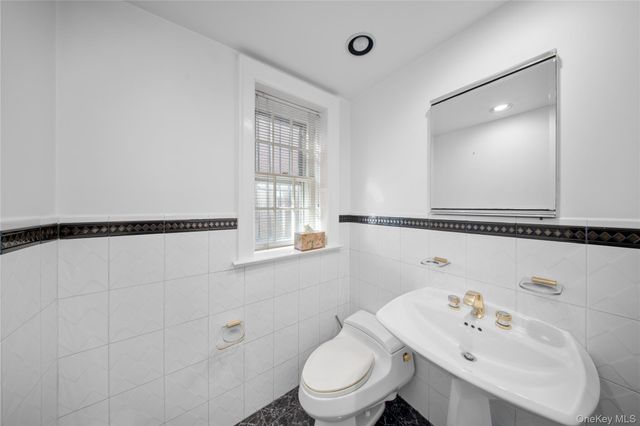 6954 Dartmouth Street, Forest Hills, NY 11375