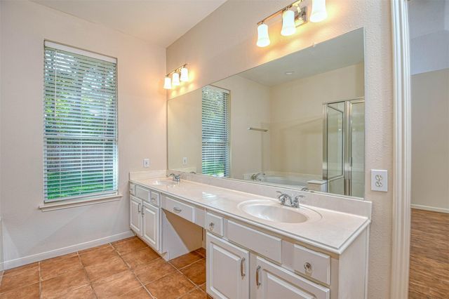65 W Night Heron Place, The Woodlands, TX 77382