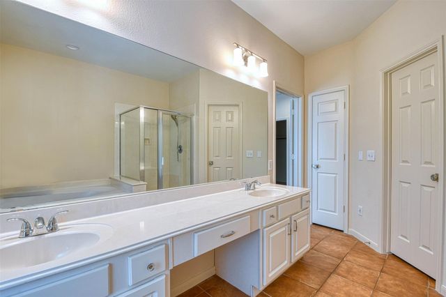 65 W Night Heron Place, The Woodlands, TX 77382