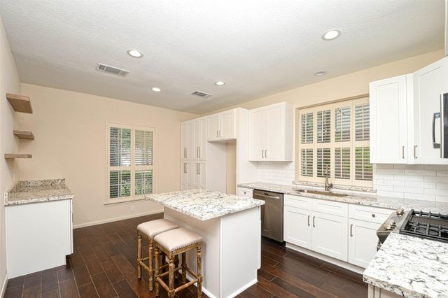 65 W Night Heron Place, The Woodlands, TX 77382