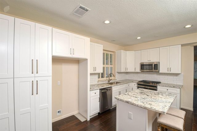 65 W Night Heron Place, The Woodlands, TX 77382