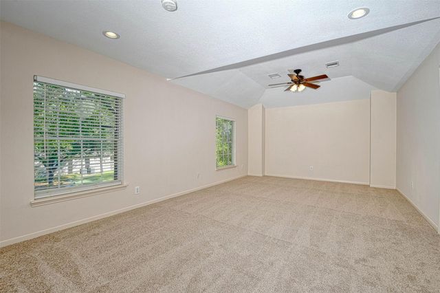 65 W Night Heron Place, The Woodlands, TX 77382