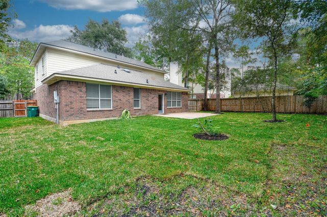 65 W Night Heron Place, The Woodlands, TX 77382
