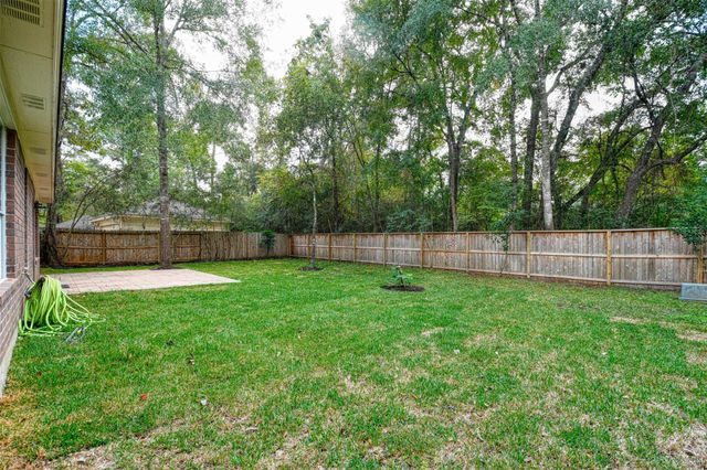 65 W Night Heron Place, The Woodlands, TX 77382
