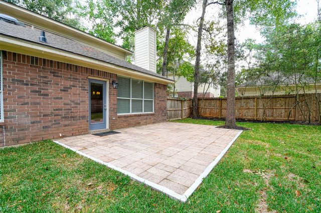 65 W Night Heron Place, The Woodlands, TX 77382