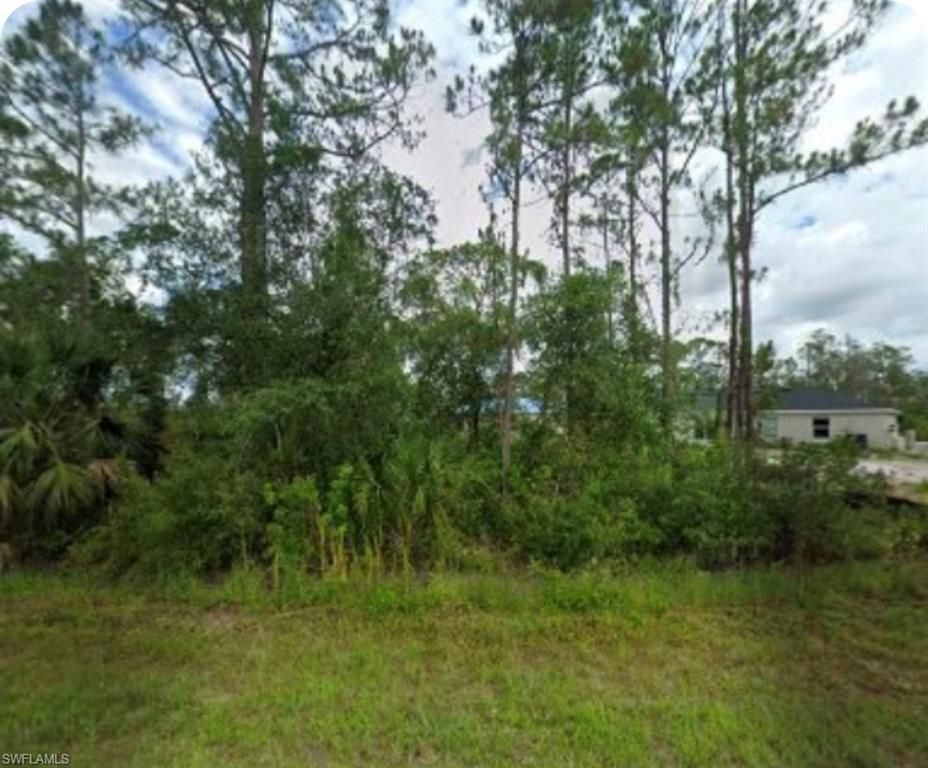 1956 Quintero LN, LEHIGH ACRES, FL 33972 — exterior