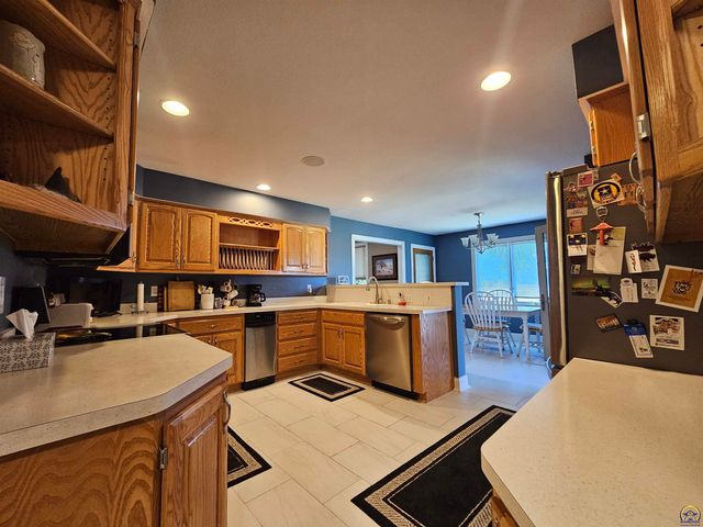 1525 SW Village DR, Topeka, KS 66604