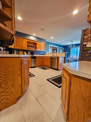 1525 SW Village DR, Topeka, KS 66604