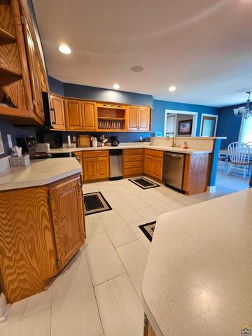 1525 SW Village DR, Topeka, KS 66604