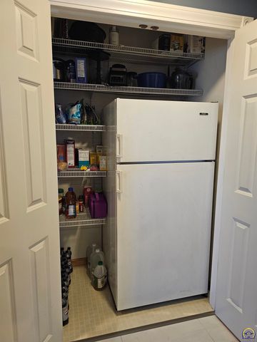 1525 SW Village DR, Topeka, KS 66604