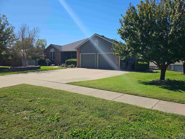 1525 SW Village DR, Topeka, KS 66604