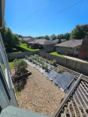 1525 SW Village DR, Topeka, KS 66604