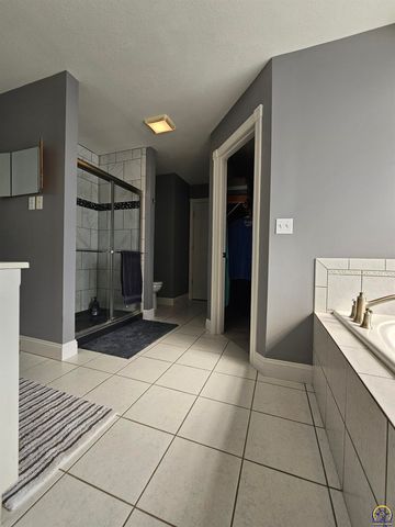 1525 SW Village DR, Topeka, KS 66604