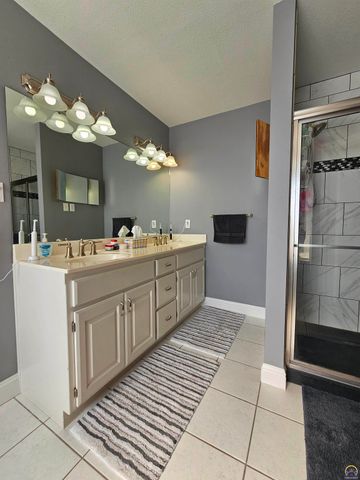 1525 SW Village DR, Topeka, KS 66604