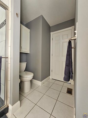 1525 SW Village DR, Topeka, KS 66604