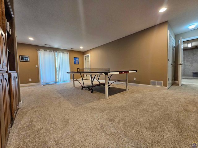 1525 SW Village DR, Topeka, KS 66604